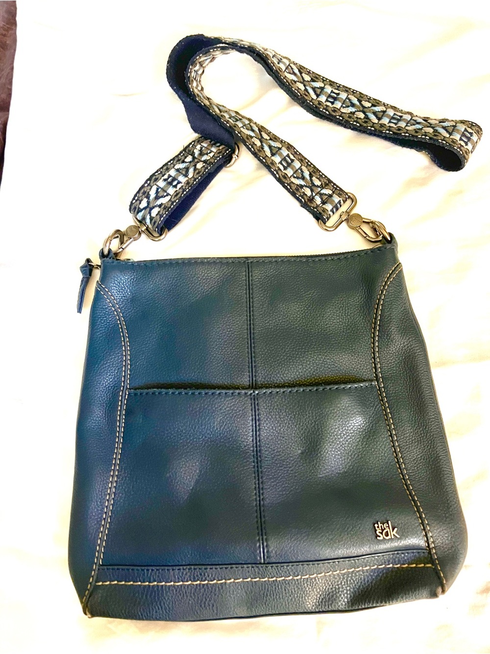 The Sak Navy Leather Crossbody Bag with Patterned Strap